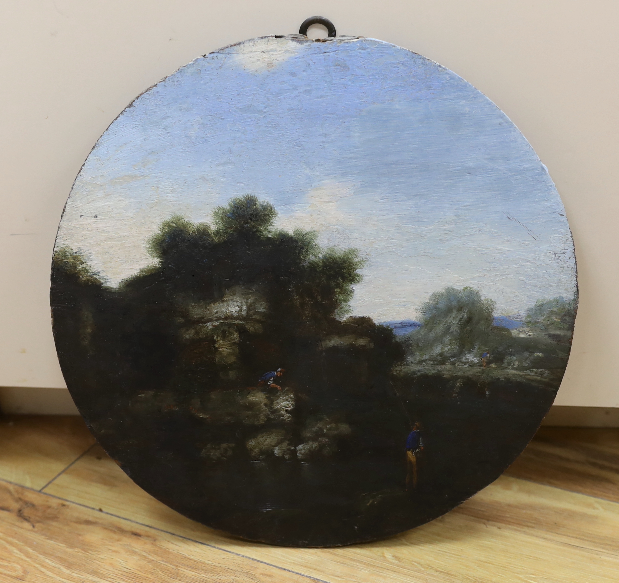 19th century English school, circular oil on wood panel, River landscape with figures fishing, unframed, 32cm in diameter